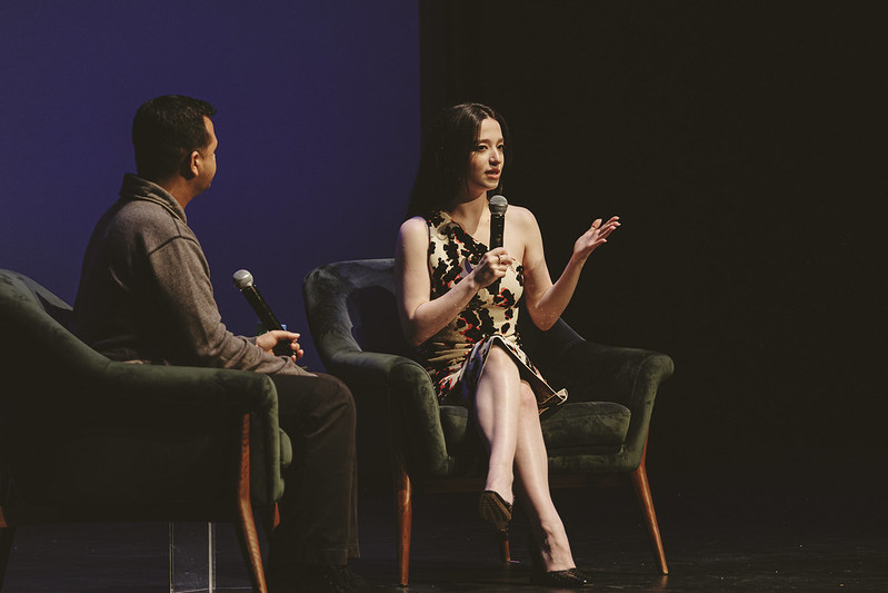 Woman speaking at the 37th Annual VAFF event, seated with interviewer.