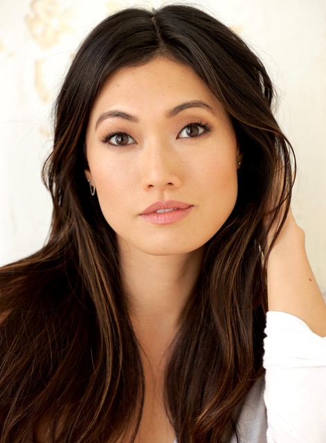 Catherine Haena Kim headshot. Brunette actress with a serene expression.
