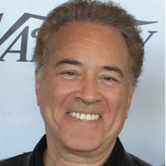 Headshot of Lee Caplin smiling at a Variety event.