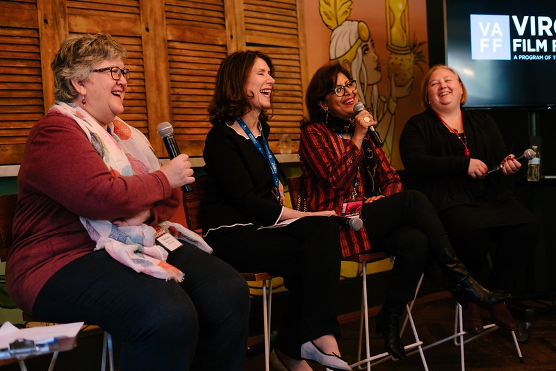 Panel of women laughing at the Virginia Film Festival event.