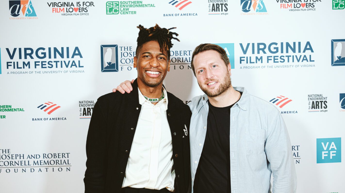 Two men at The Virginia Film Festival, smiling for the camera.