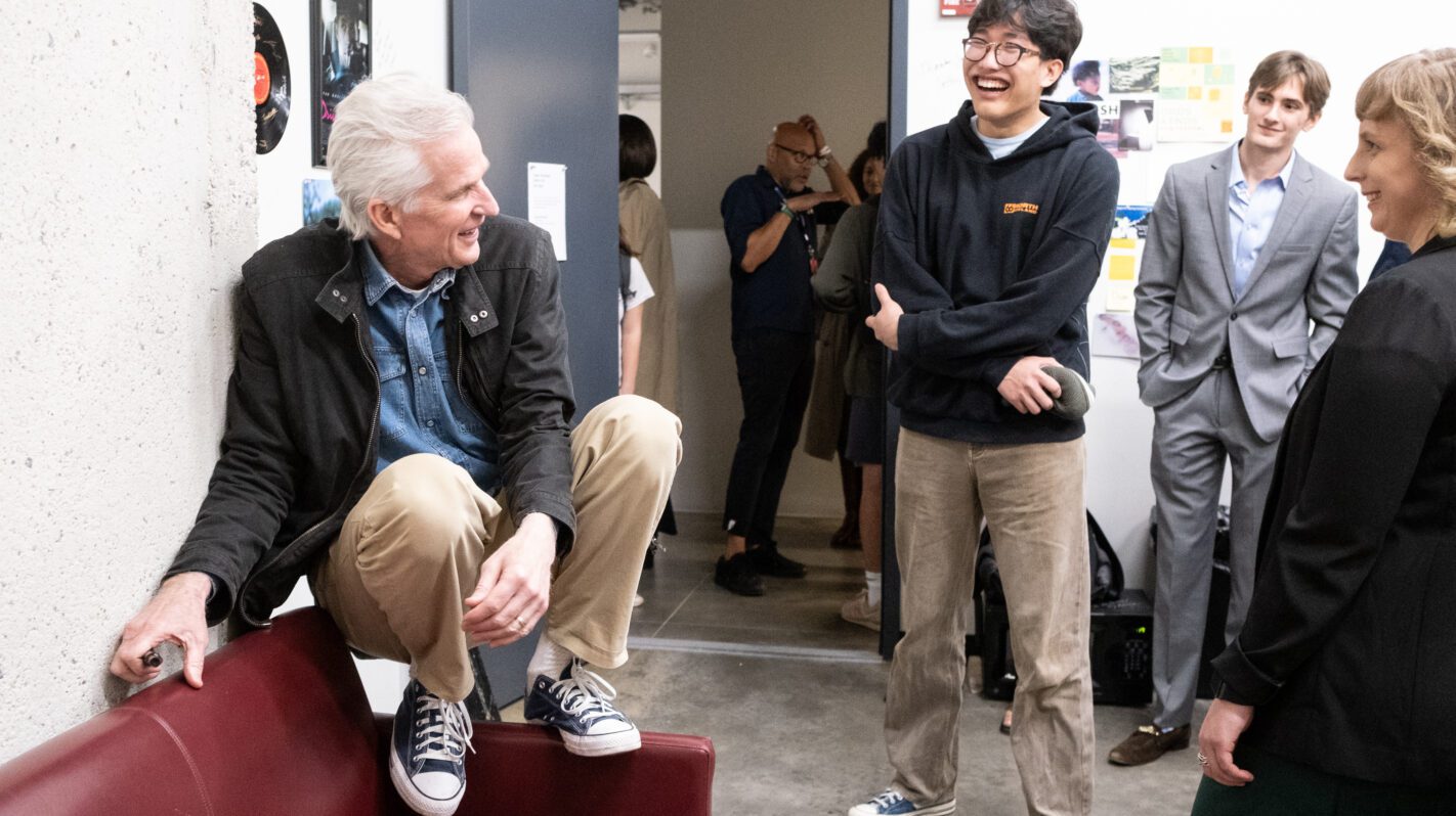 Virginia Film Festival: Man sits on couch, talking to a group of people.
