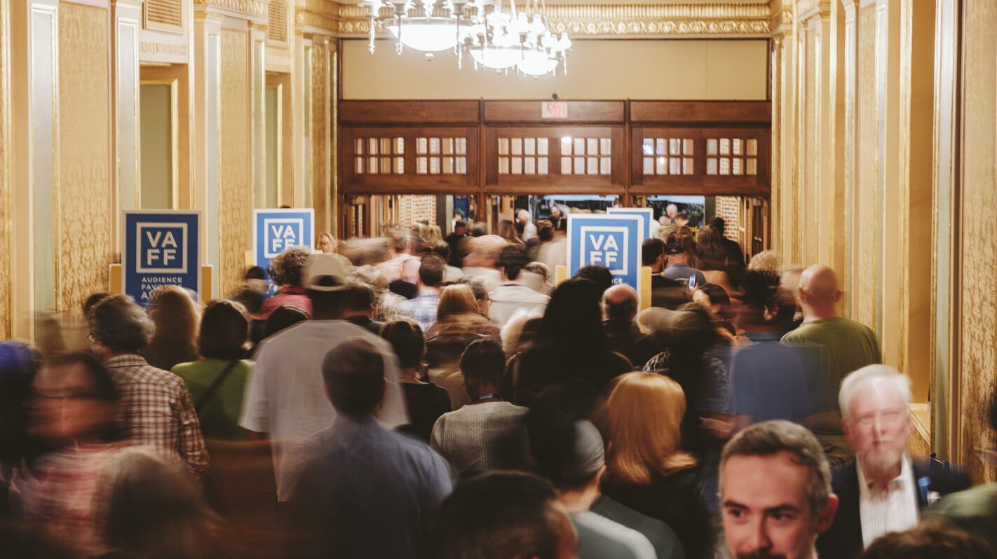 Crowd entering the Virginia Film Festival. VAFF signage visible.