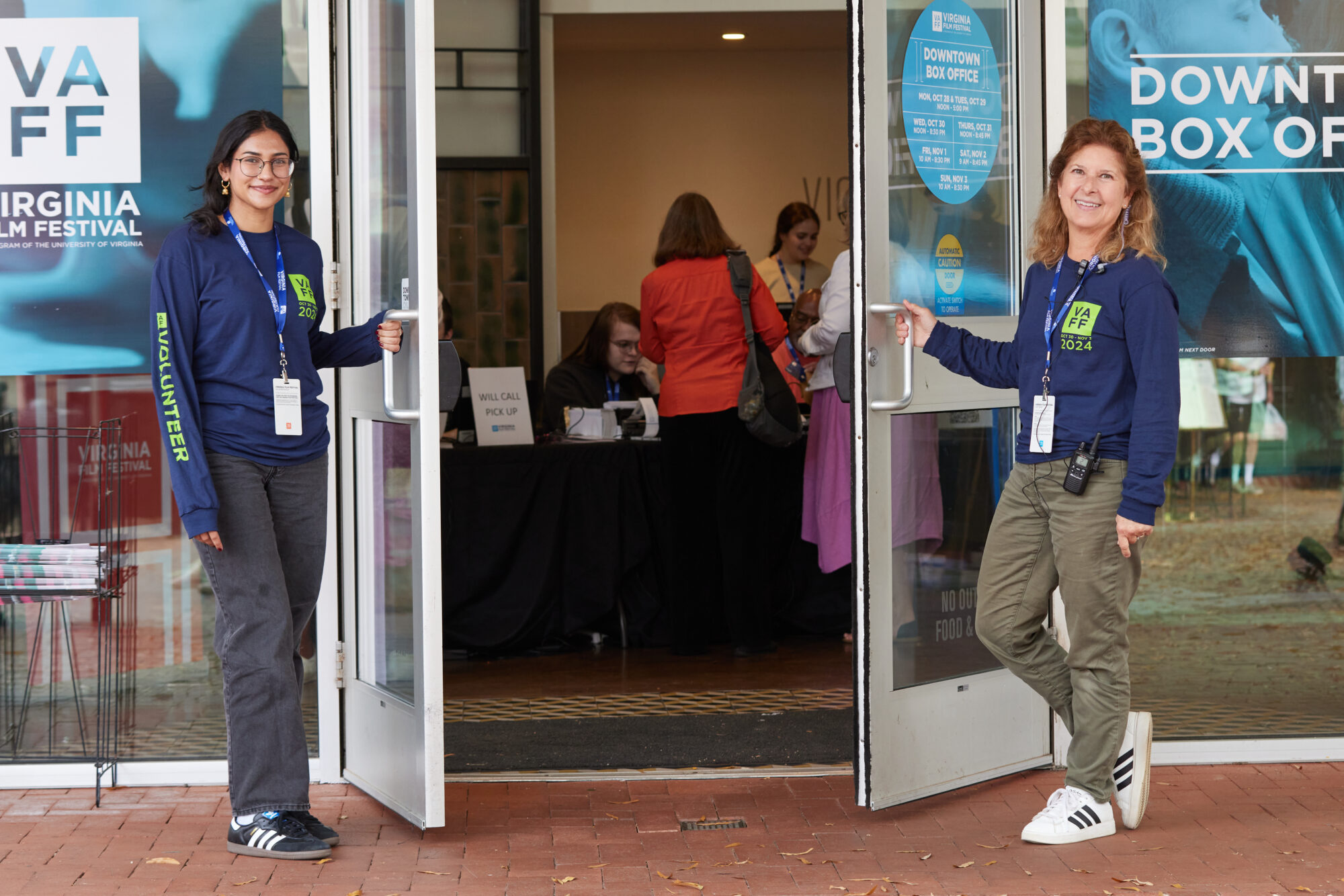 Volunteers at the Virginia Film Festival welcome visitors at the Downtown Box Office. VAFF 2024.