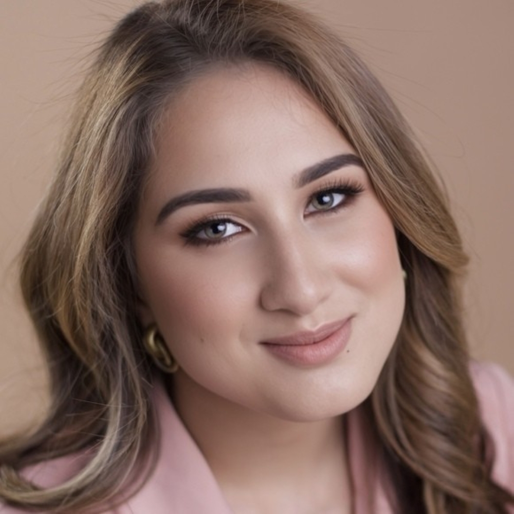 Headshot of Rebe Malaret.